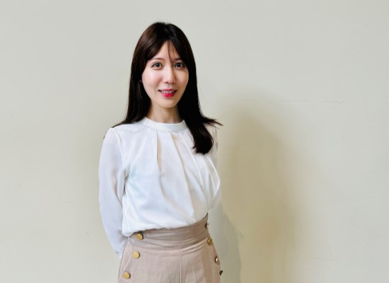 女性社員M.H